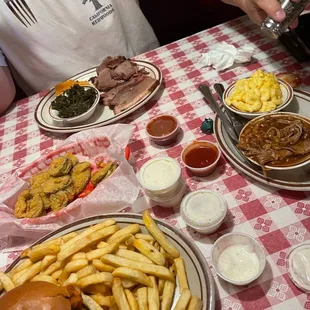 Buffalo chicken sandwich, fried pickles, beef brisket platter