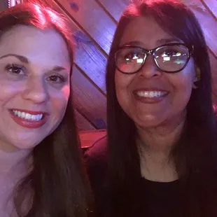 two women smiling for the camera