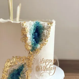 a birthday cake with a slice taken out of it