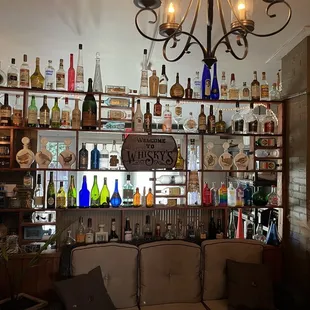 a couch and a chandelier