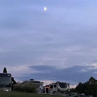 Moon with campers (view from a fire ring)