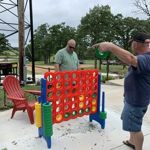 two men playing a game of connect