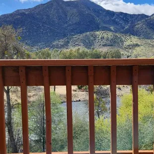 Beautiful view off the balcony and patio table and chairs.