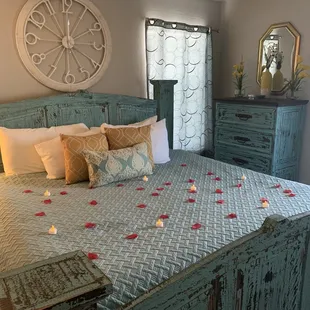 Rose petals and candle lites hubby requested.