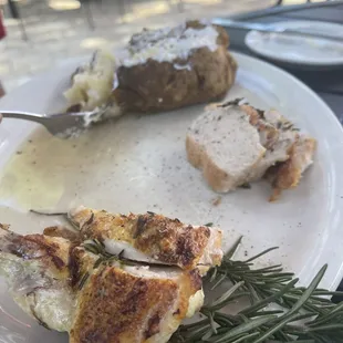 Roasted chicken and a baked potato