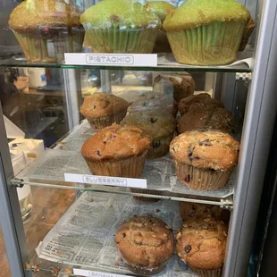 a display case of muffins and muffins