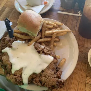Chicken fried steak came with fries roll green beans and soup
