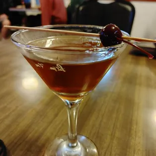 a cocktail in a martini glass