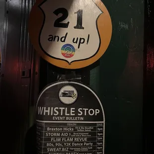 a sign for a whistle stop