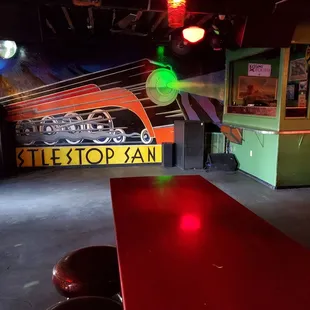 a red table and red stools