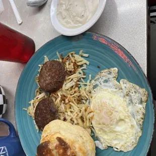 One egg with sausage breakfast: comes with biscuit and gravy
