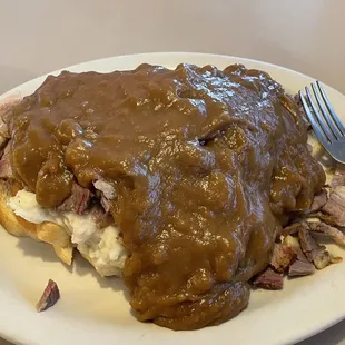 My wife considers herself to be an Open face roast beef sandwich connoisseur and she says this is possibly the best she's had