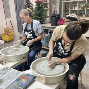 Team bonding event on the pottery wheel.