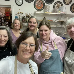 A class of pottery students.