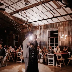 Mother and groom dance