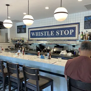 a man sitting at the bar