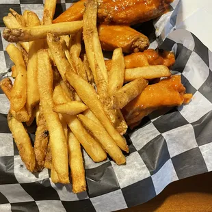 a basket of fries and a hot dog