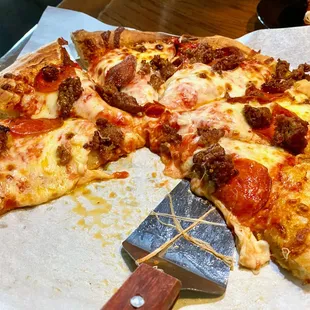 Pepperoni and sausage pizza that was melt-in-your-mouth delicious