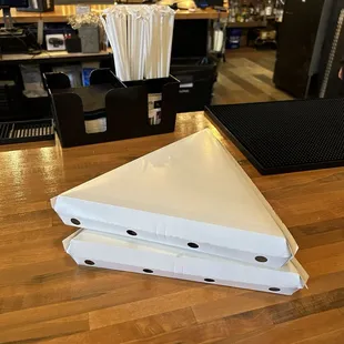 2 pizza sliced boxed up