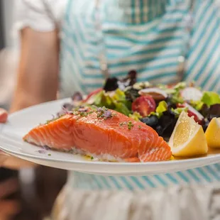 Baked salmon with lemon and chives.