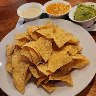 Chips, queso, salsa, guacamole