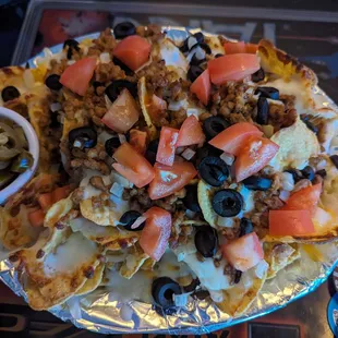 Half order of Super Nachos for $13.25.