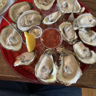 Dozen raw oysters