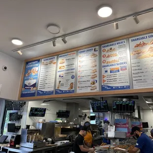 menus on the wall of a restaurant