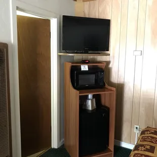 Tv , microwave, mini fridge