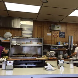 two people working in a commercial kitchen