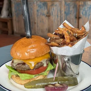 Cheeseburger =art! This is a  five star burger!! Perfectly cooked served w/ absolutely delicious truffle Truffle Parmesan Fries