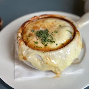 French onion soup is delicious must have a fork and knife to go with the spoon