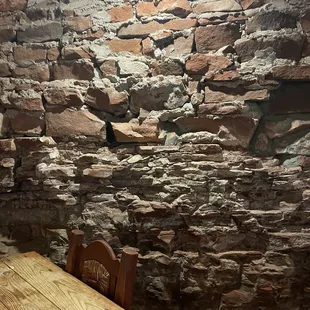 We sat downstairs. It was much brighter than I expected. Very pleasant!  The walls of this place built in 1925 are so interesting!