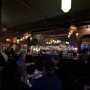 people sitting at the bar