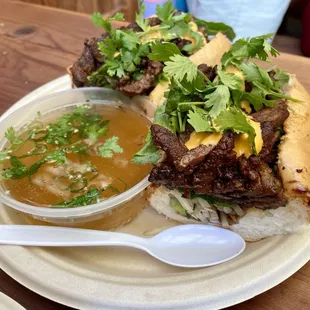 Pho'rench Dip ($16) - beef Banh-Mi "French dip" sandwich with Pho soup broth for dunking.