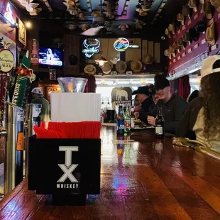 a bar with a wooden bar top