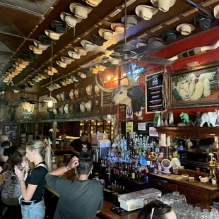 a group of people at the bar