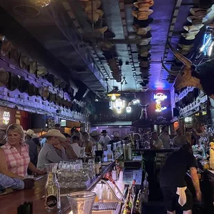 customers sitting at the bar