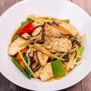 a plate of stir fried vegetables