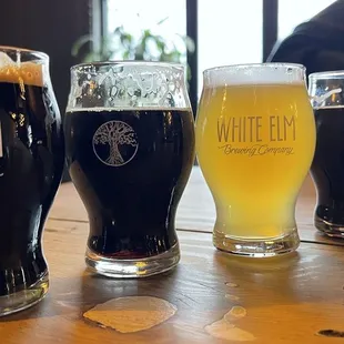 Flights from left right 1. Cinnamon roll stout 12%. 2. monochrome 6% absolutely delicious 3. Peachy Keen 5% 4. Lick the spoon 12%.