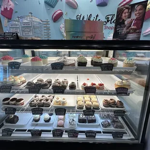 a display of cupcakes
