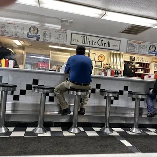 people sitting at the counter