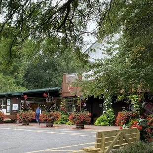 a woman walking in front of the store