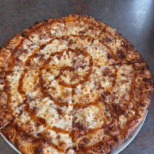 Saucy Chick pizza. Bbq sauce , grilled chicken , onions , cheese and bbq  sauce. It was amazing.