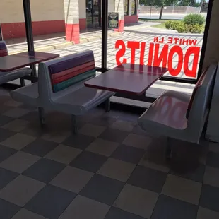 A couple booths &amp; a larger table for hanging out