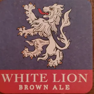 a white lion on a blue background