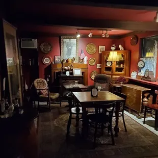 a dining room with red walls