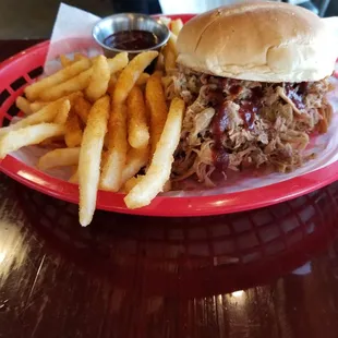 Pulled pork sandwich and seasoned fries (special of the day)