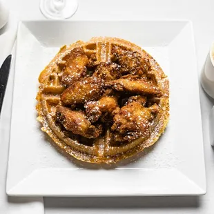 Chicken + Bacon Waffle
Crispy Chicken Wings · Pecan Smoked Bacon 
Syrup · Powdered Sugar