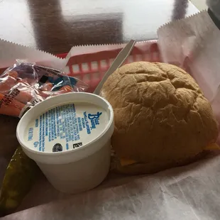 a cup of soup and a sandwich